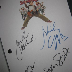 May include: A white sheet of paper with black and blue signatures from the cast of the movie School of Rock. The signatures include Jack Black,  Mike White, and  Kevin Sussman. The movie title is written in red at the top of the page.
