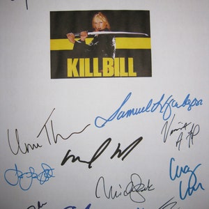May include: A white sheet of paper with multiple signatures in blue and black ink. The signatures include Uma Thurman, Michael Madsen, and Samuel L. Jackson. The paper also features a black and yellow poster for the movie "Kill Bill" with a woman holding a sword.