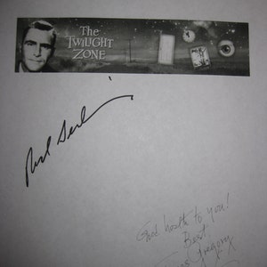 May include: A black and white photo of a man from the television show "The Twilight Zone". The photo is signed by Earl Holliman, Paul  and James Gregory. The signature reads "Good health to you! Best, James Gregory".