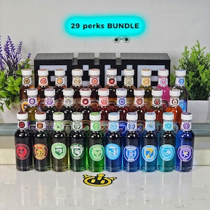 May include: A display of small glass bottles filled with coloured liquids and diverse label designs. The text "29 perks BUNDLE" is shown above. The bottles are arranged in rows, suggesting a themed product, possibly a gift set.