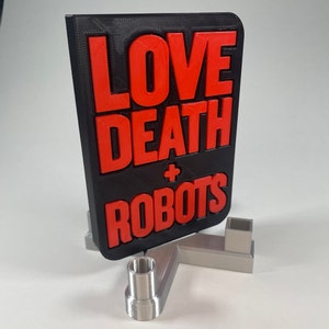 Love, Death + Robots freestanding logo and pen holder