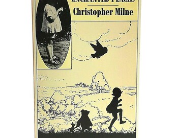 May include: A vintage book cover with a yellow background and black text. The title is "The Enchanted Places" by Christopher Milne. The cover features a silhouette of a girl running, a bear, a pig, and a bird flying in the sky.