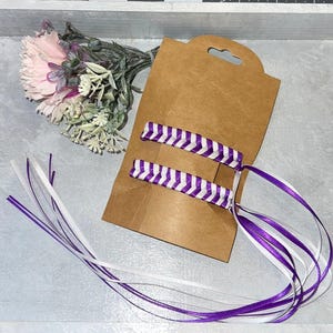 The 80’s are back here with these ribbon barrettes. I have a variety of colors, and I only made 9 total.