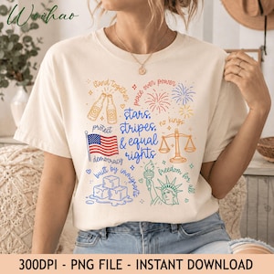 以下が含まれることがあります： 「stars, stripes, & equal rights」という文字と、アメリカ国旗、花火、天秤、自由の女神像、氷のイラストが描かれたカラフルなグラフィックプリントが特徴のクリーム色のTシャツ。