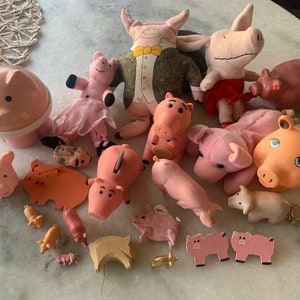 Cerdos en una bolsa, 24 corrales, cerdos con personajes de dibujos animados y libros, usados