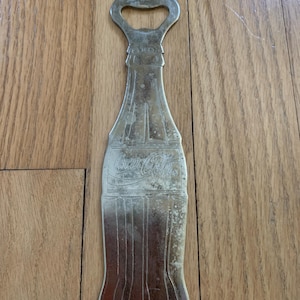 Apribottiglie Coca Cola vintage in metallo, usato