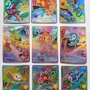 May include: A collection of nine holographic trading cards featuring various Pokémon characters including Bulbasaur, Charmander, Squirtle, Turtwig, Chimchar, Piplup, Rowlet, Litten, and Popplio, each with colorful illustrations, attack stats, and text.