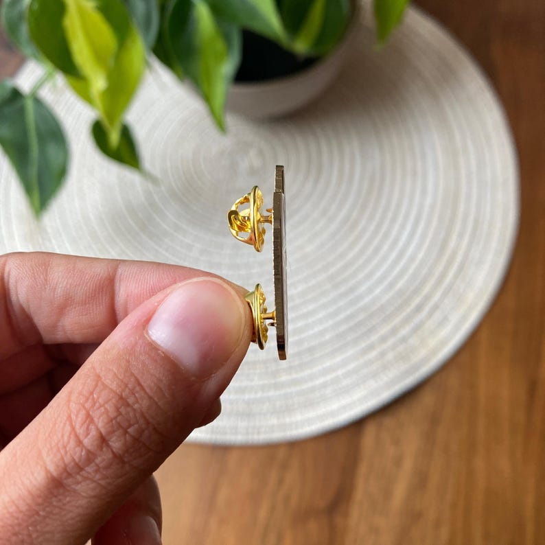 Media bottle enamel pin