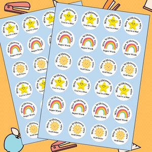 May include: Two sheets of blue sticker paper with various colorful stickers. The stickers feature a yellow star, a rainbow, and a sun with the text "Miss Wilkinson says" and a phrase like "You're a Star", "Super Work", or "Well Done".