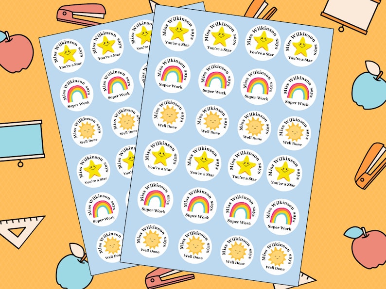 May include: Two sheets of blue sticker paper with various colorful stickers. The stickers feature a yellow star, a rainbow, and a sun with the text "Miss Wilkinson says" and a phrase like "You're a Star", "Super Work", or "Well Done".