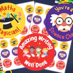 May include: A set of colourful round stickers with various designs and text. The stickers feature a maths magician, a science champ, and children writing. The text on the stickers includes "Maths Magician!", "You're a Science Champ!", and "Amazing Writing Well Done".