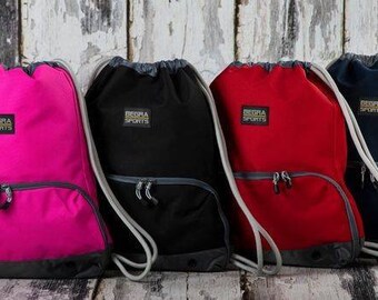 Gym bag with shoe and wet compartment including ventilation opening