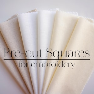 May include: A collection of pre-cut fabric squares in various shades of white and beige, perfect for embroidery projects. The squares are arranged in a fan shape, with the text "Pre-cut Squares for embroidery" printed on top.