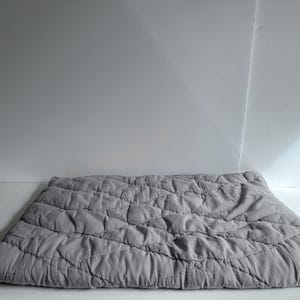 Diamond Pattern Tufted Style Standard Pillow Cover from West Elm