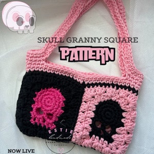 May include: A pink and black crochet bag with a skull pattern. The bag has a pink strap and is made with granny squares. The text "SKULL GRANNY SQUARE PATTERN" is written in black letters on a pink background.