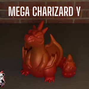 May include: A red and orange Mega Charizard Y Pokemon figure with a large wingspan and a fierce expression. The figure is made of plastic and has a glossy finish.