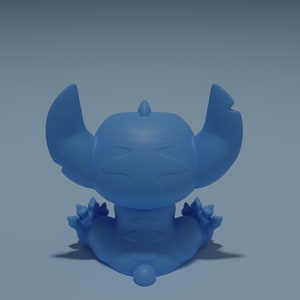May include: A blue cartoon character with large ears and a stitched design on its body. The character is sitting with its back to the viewer.