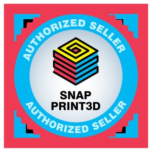 May include: A blue and red circular badge with a white center. The badge has the text "AUTHORIZED SELLER" in a red circle around the outside and "AUTHORIZED SELLER" in a blue circle around the inside. The center of the badge has a stylized image of a 3D printer with the text "SNAP PRINT3D" below it.