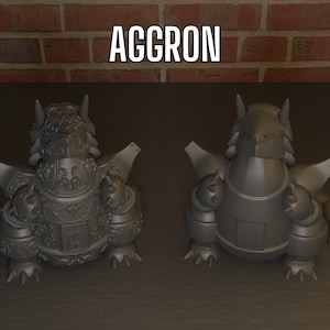 May include: A gray 3D printed model of Aggron, a Pokemon. The model is posed in two different views, one from the front and one from the back. The model is detailed with intricate armor plating and spikes.