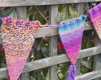 HAND KNITTED BUNTING - multi coloured wool flags with tassel embellishment at end of each of 5 flags, 2 metre length, adjustable on length