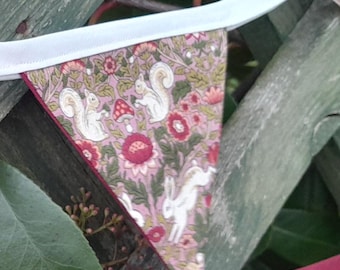 Woodland themed fabric bunting, birds, squirrels, hares with floral effect on background, wall hanging / garland which is double sided
