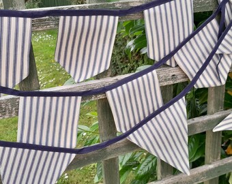 Handmade NAVY STRIPE BUNTING, heavier fabric cream background banner flags, finished on navy bias binding, 1.4 metre plus ties, 9 flags.