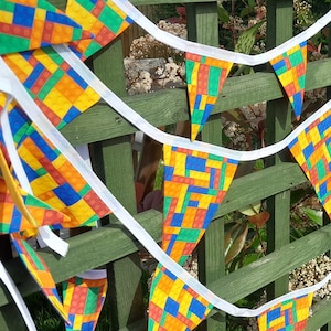 STACKING BRICK toy themed BUNTING, fabric triangles in med / mini flags, different lengths -white bias binding,  8 - 17 flags colourful.