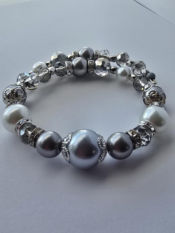 Silver beads and pearls memory wire bracelet.