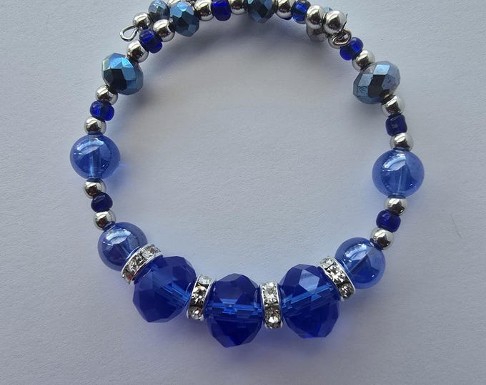 Sapphire blue and silver beads memory wire bracelet.
