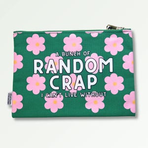 May include: Green zippered pouch with a pink floral pattern. The pouch has the text "A bunch of random crap I can't live without" printed on it.