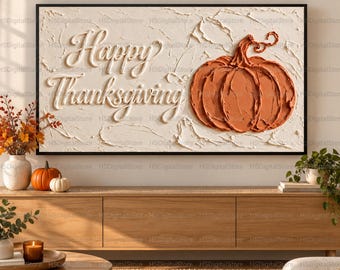 May include: A rectangular wall art piece featuring a textured cream-colored background with the embossed white text Happy Thanksgiving and a large, raised orange pumpkin illustration with visible impasto brushstroke details.