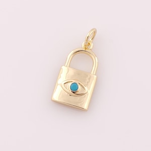 May include: Gold padlock charm with a blue evil eye design.