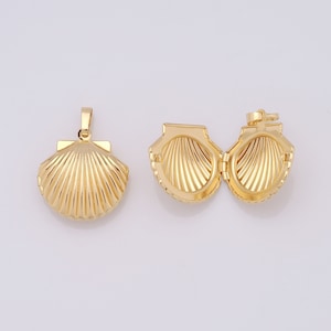 May include: Gold seashell locket pendant with a hinged opening. The locket is closed on the left and open on the right, revealing the interior.