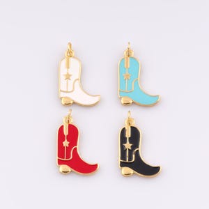 May include: Four gold-tone cowboy boot charms with enamel paint in white, turquoise, red, and black. Each boot has a gold star on the shaft.