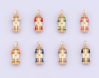 May include: Eight gold-coloured race car pendants with colourful enamel accents. Each pendant features a different colour scheme, including red, green, pink, orange, blue, purple, and black. The pendants have a detailed design with small, clear stones.