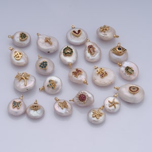 May include: Assortment of 18 white pearl charms with gold accents and colorful crystal embellishments. Each charm features a different design, including hearts, stars, butterflies, palm trees, and more.