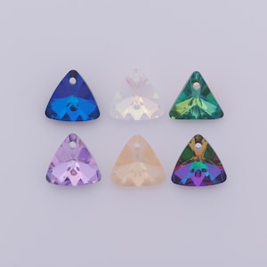 May include: Six iridescent triangle-shaped crystal pendants in various colors: blue, clear, green, purple, peach, and a mix of purple and green. Each pendant has a small hole at the top for stringing.