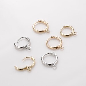May include: Six gold and silver hoop earring findings with jump rings. The findings are perfect for adding to your jewelry making projects.