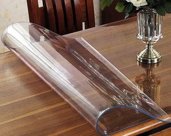 Op maat gemaakt, beschermend, transparant tafelkleed. 2 mm zacht glas – diverse maten en vormen (zie de beschrijving voor de prijs per m²!).