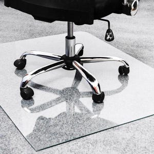 May include: A clear, rectangular floor mat made of rigid material placed underneath a black office chair. The chair features a chrome-finished five-point base with black plastic casters and a height adjustment lever with a white icon.