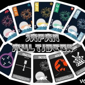 May include: A set of playing cards with a Japanese theme. The cards feature illustrations of fireworks, a mountain, and a samurai. The text on the cards includes Japanese characters and the words "Japan Multideck".