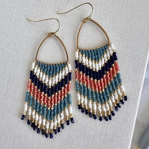 Seed Bead Dangle Fringe Earrings - Geometric Multicolor Pattern of Cream, Coral, Navy, Teal, Gold on Triangle Gold Form - approx. 2.75 in.