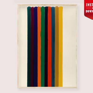 May include: Abstract art print featuring vertical brushstrokes in various colors, including green, orange, blue, and yellow, against a cream background. The artwork is framed in a light wood frame. A red banner in the upper right corner reads "INSTANT DOWNLOAD".