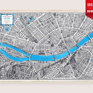 May include: A framed map of Budapest, Hungary, in black and white with a vibrant blue river running through the city. The map includes bridges, buildings, and street details. The top right corner has a red banner that says "INSTANT DOWNLOAD".
