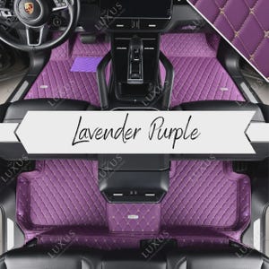 May include: Lavender purple car floor mats with a diamond-stitched pattern and gold-colored thread accents. The mats are shown installed in a car interior, with the steering wheel and console visible. The text "Lavender Purple" is displayed.