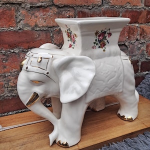 Large ceramic pottery elephant gold and floral decor indoor home decor plants