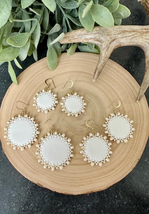 Ivory beaded earrings on white polished moose leather with 14K plated hooks