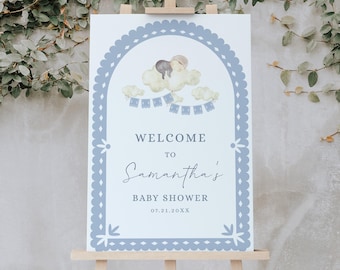 May include: A baby shower welcome sign on an easel. The sign has a blue scalloped border and features the text "WELCOME TO Samantha's BABY SHOWER 07.21.20XX". A cloud illustration with a baby is at the top.