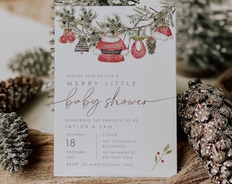 May include: A white baby shower invitation with a watercolour illustration of a Christmas tree branch with ornaments, including a Santa Claus outfit, a baby bib, and a pine cone. The text reads "Please join us for a Merry Little Baby Shower honouring the parents-to-be Taylor & Sam, Saturday, December 18, 2023, 2:00 PM, The Coleman's Residence, 123 Anywhere St., Any State 12345, RSVP to Avery (123) 456-7890."