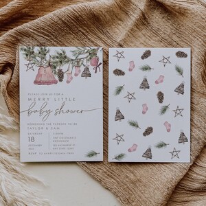 Printable Christmas baby shower invite with pine branches and pink holiday accents. Festive watercolor design with rustic woodland feel.